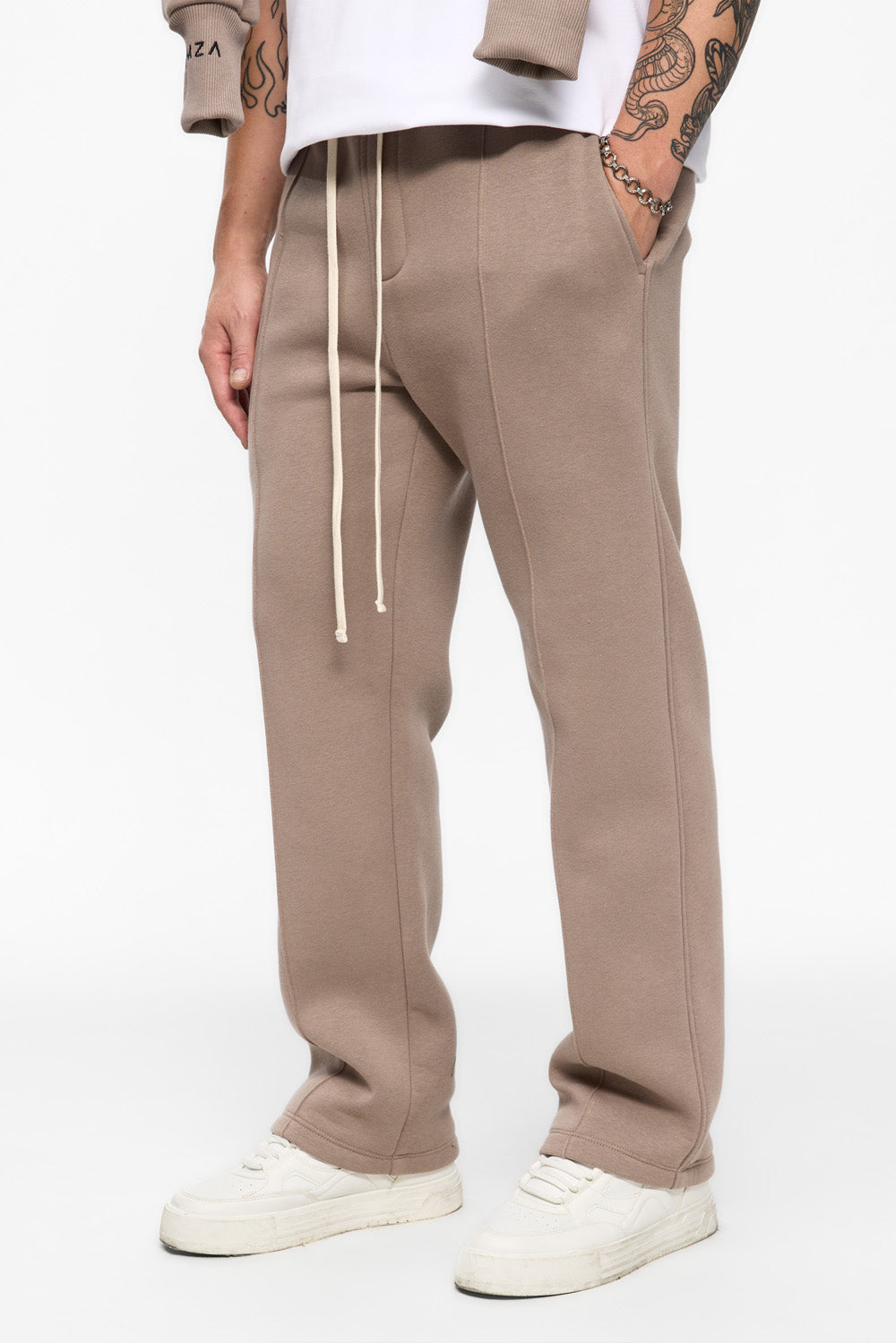 247 fleece Beige sweatpants with decorative stitching