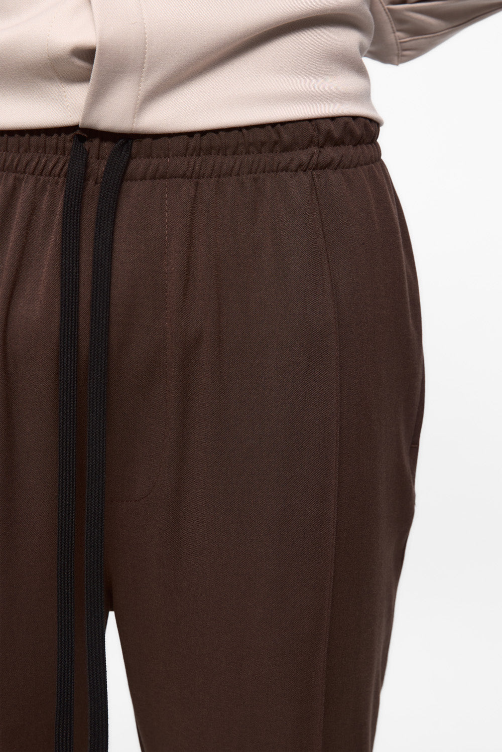 Beżowe spodnie Thom