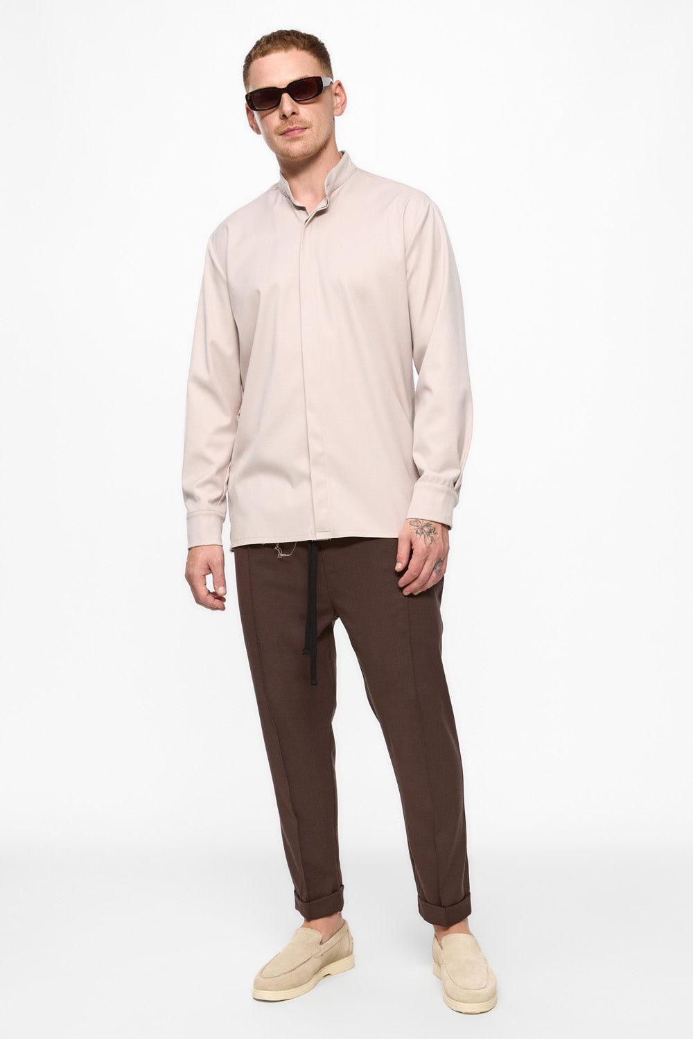 Beżowe spodnie Thom