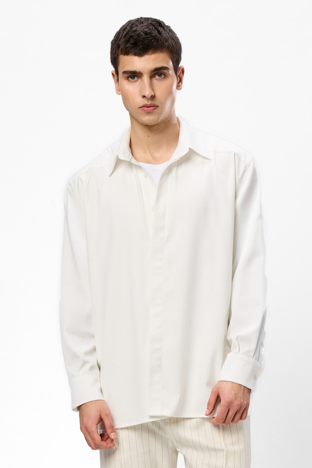 Beżowe spodnie Thom