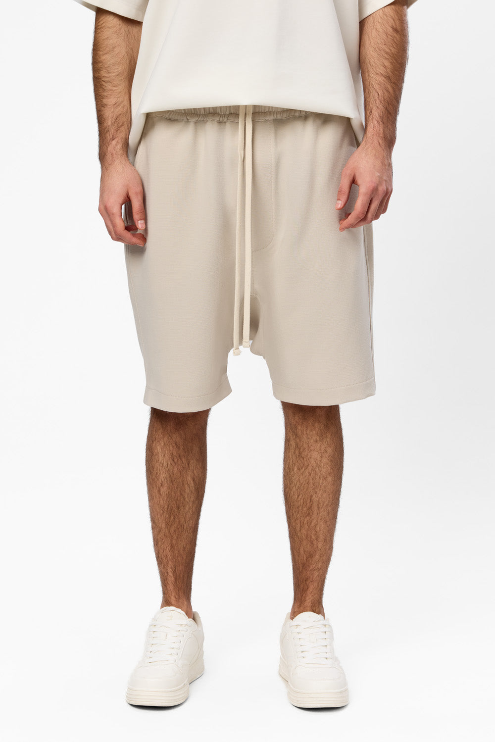 Beżowe spodnie Thom