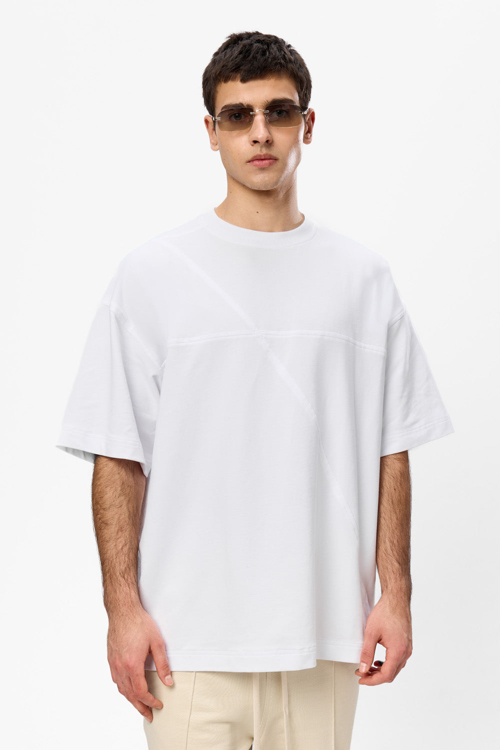 Oversized black T-shirt with decorative stitches