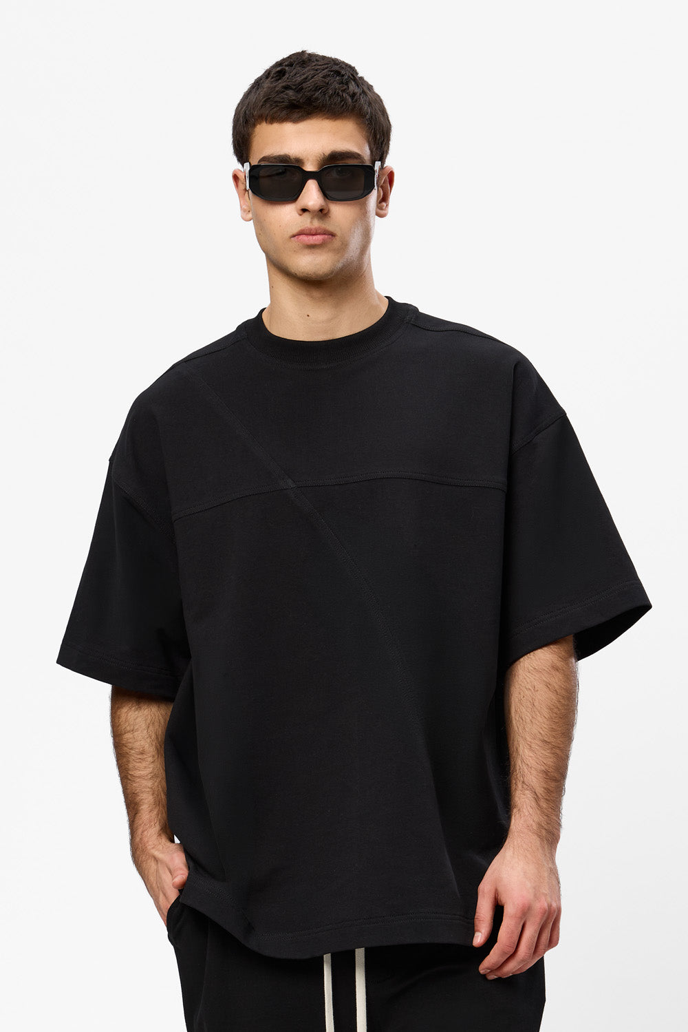 Oversized black T-shirt with decorative stitches