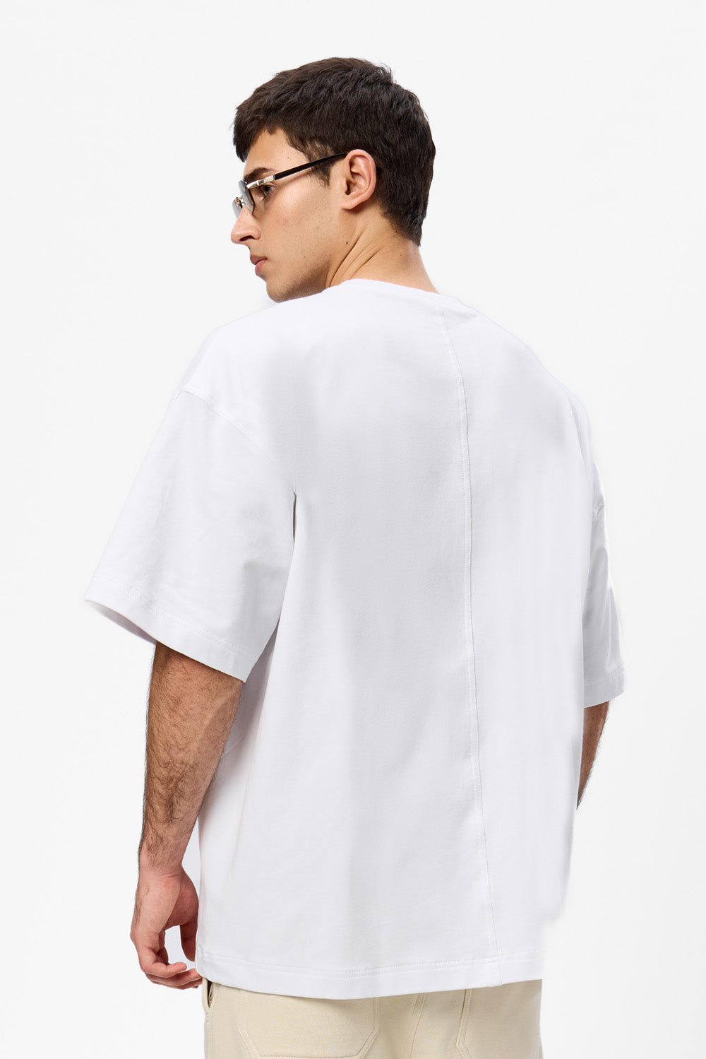 Oversized black T-shirt with decorative stitches