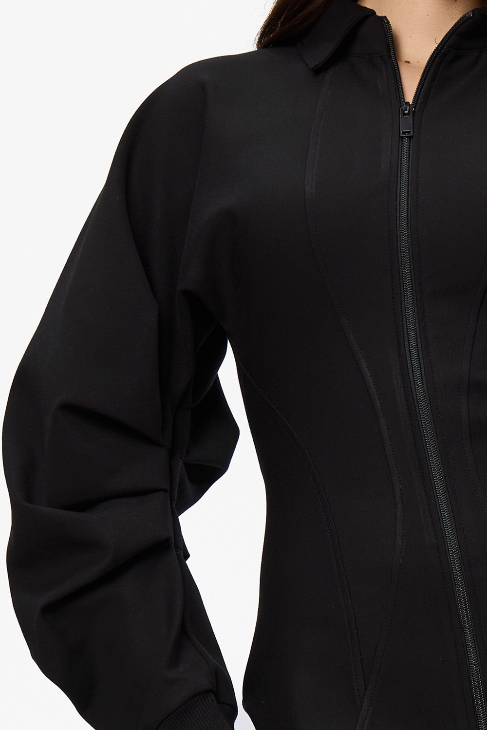 Czarna bluzka-sukienka Kaia z rękawami na gumkę i ukrytym zamkiem bocznym.